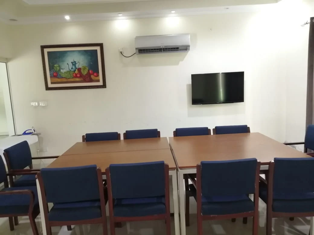 CEMB Guest House dining room with seating for guests